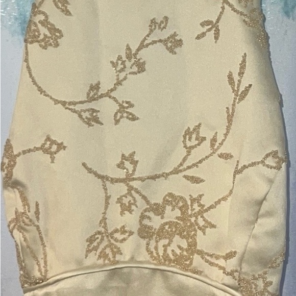 Ivory/cream dress with spaghetti straps and a zipper in the back. Gently used. - Picture 11 of 11